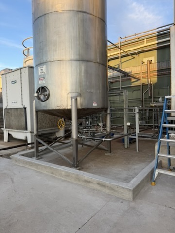 Raised concrete pad for equipment